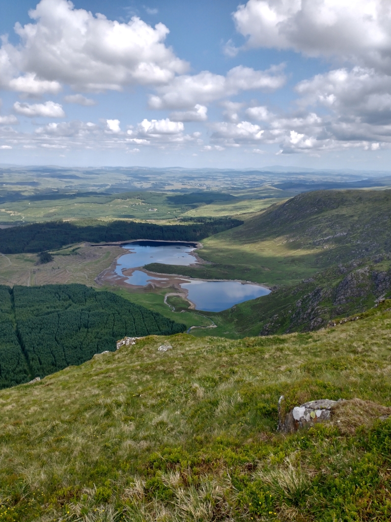 photographic view from the ridge between Corserine and Millfire with Loch Dungeon in the foreground.